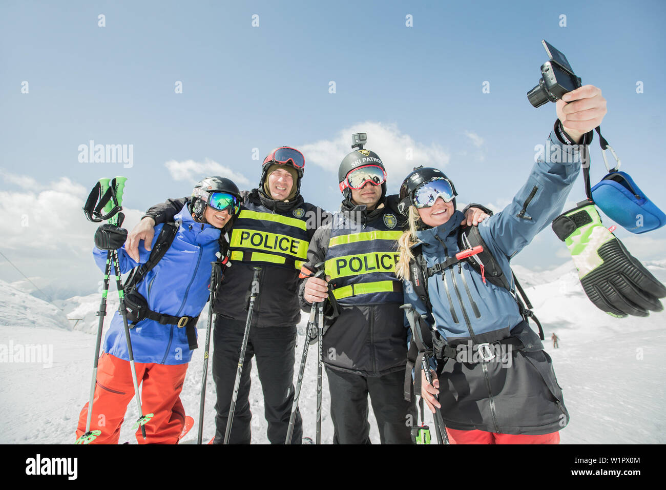Two female skiers taking a selfie with a ski police, Gudauri, Mtskheta-Mtianeti, Georgia Stock Photo