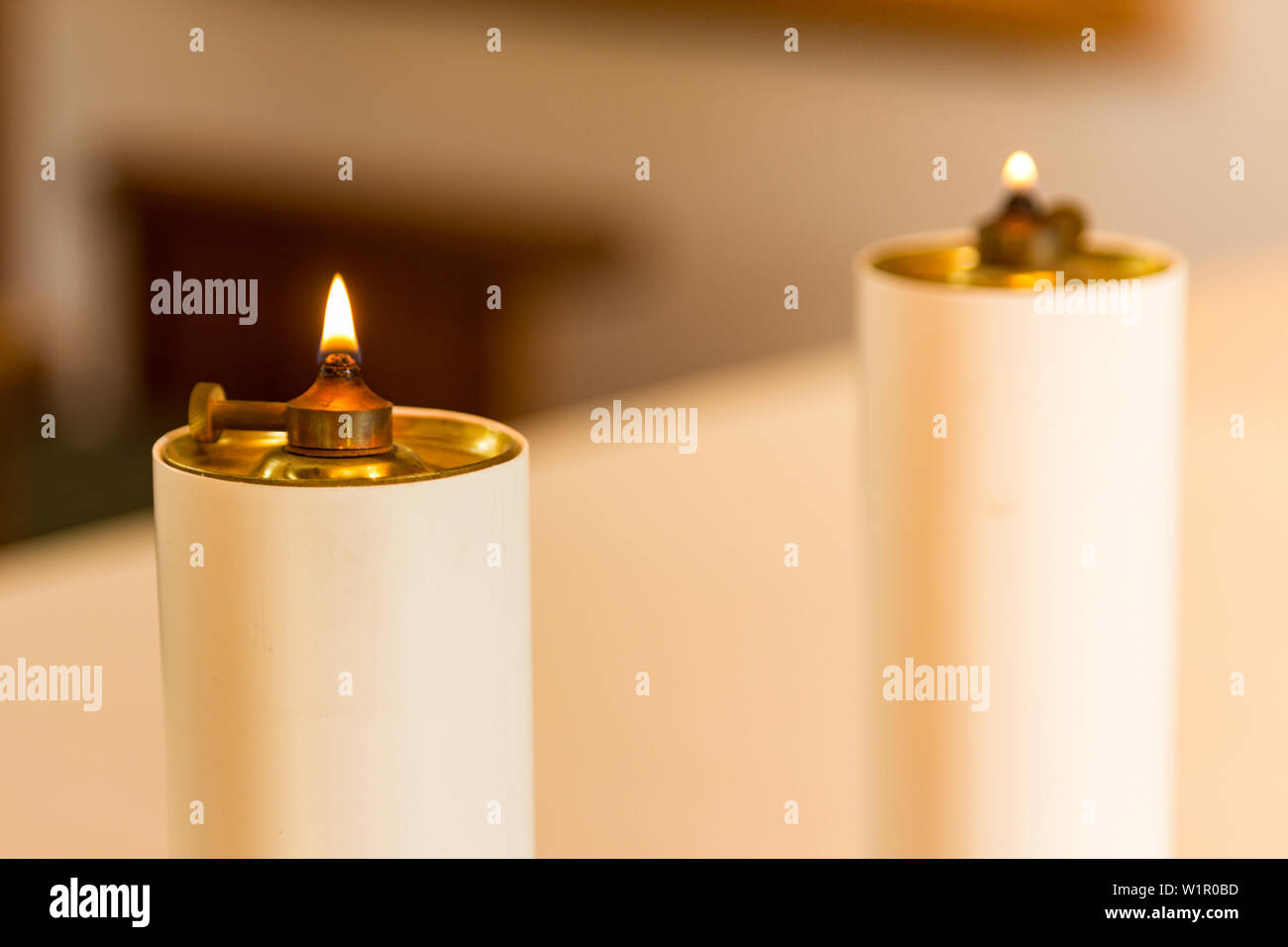 Two altar candles in chapel Stock Photo Alamy