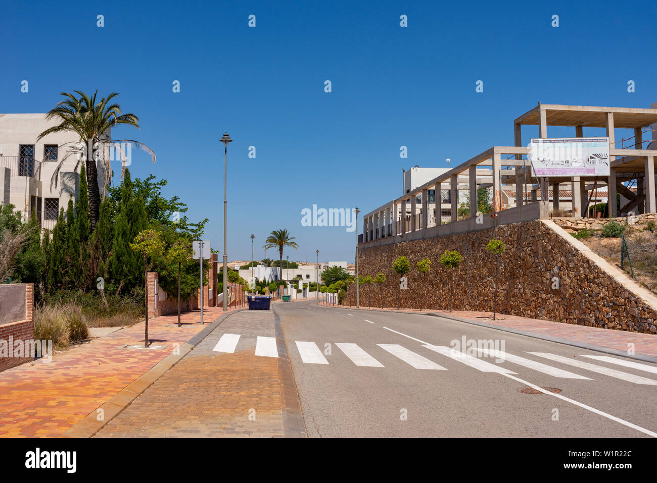 Peraleja Golf course and properties in Sucina, Murcia, Spain, Europe. Course has closed and fallen into disrepair. Frame of unfinished building Stock Photo