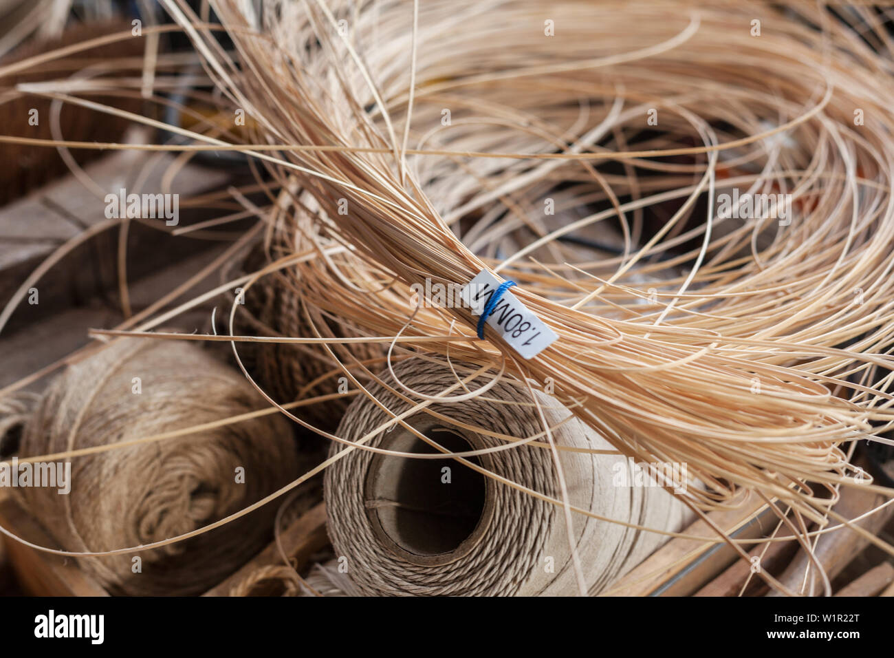 Lengths of chair cane and string Stock Photo - Alamy