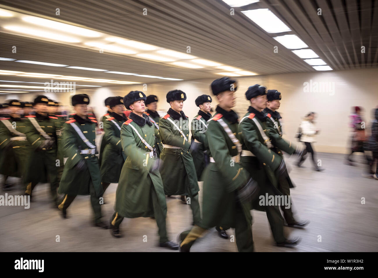 guardmen walking in lockstep through subay of Tiananmen Square, Beijing ...