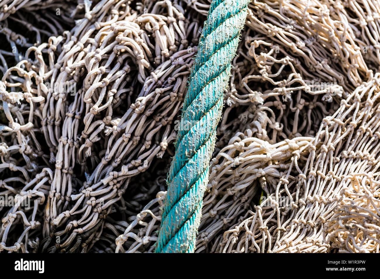 Fishing nets and a thick rope in the harbour, Port de Sóller, Mallorca, Spain Stock Photo