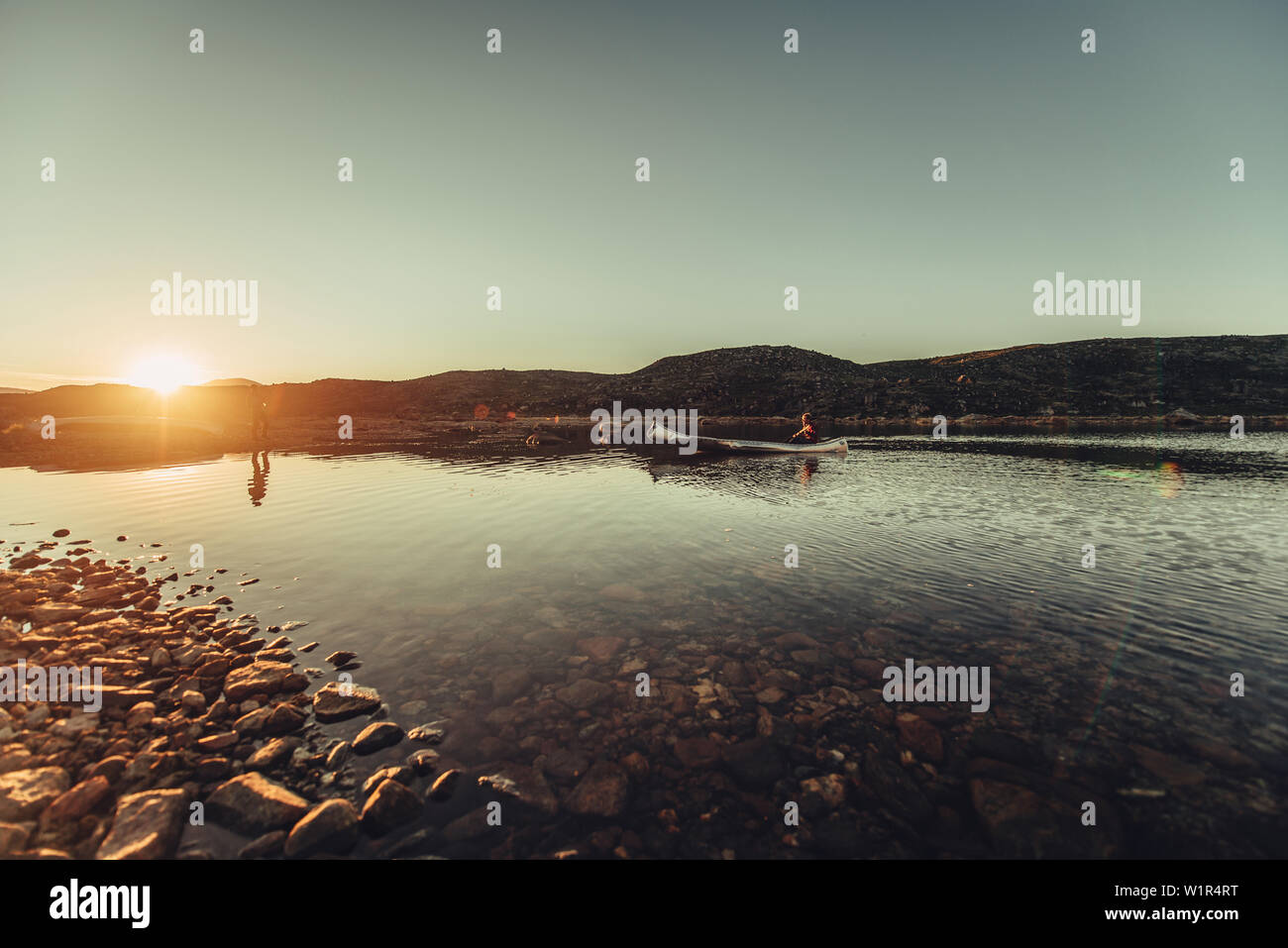 Men with a rowing boat in greenland, greenland, arctic Stock Photo - Alamy