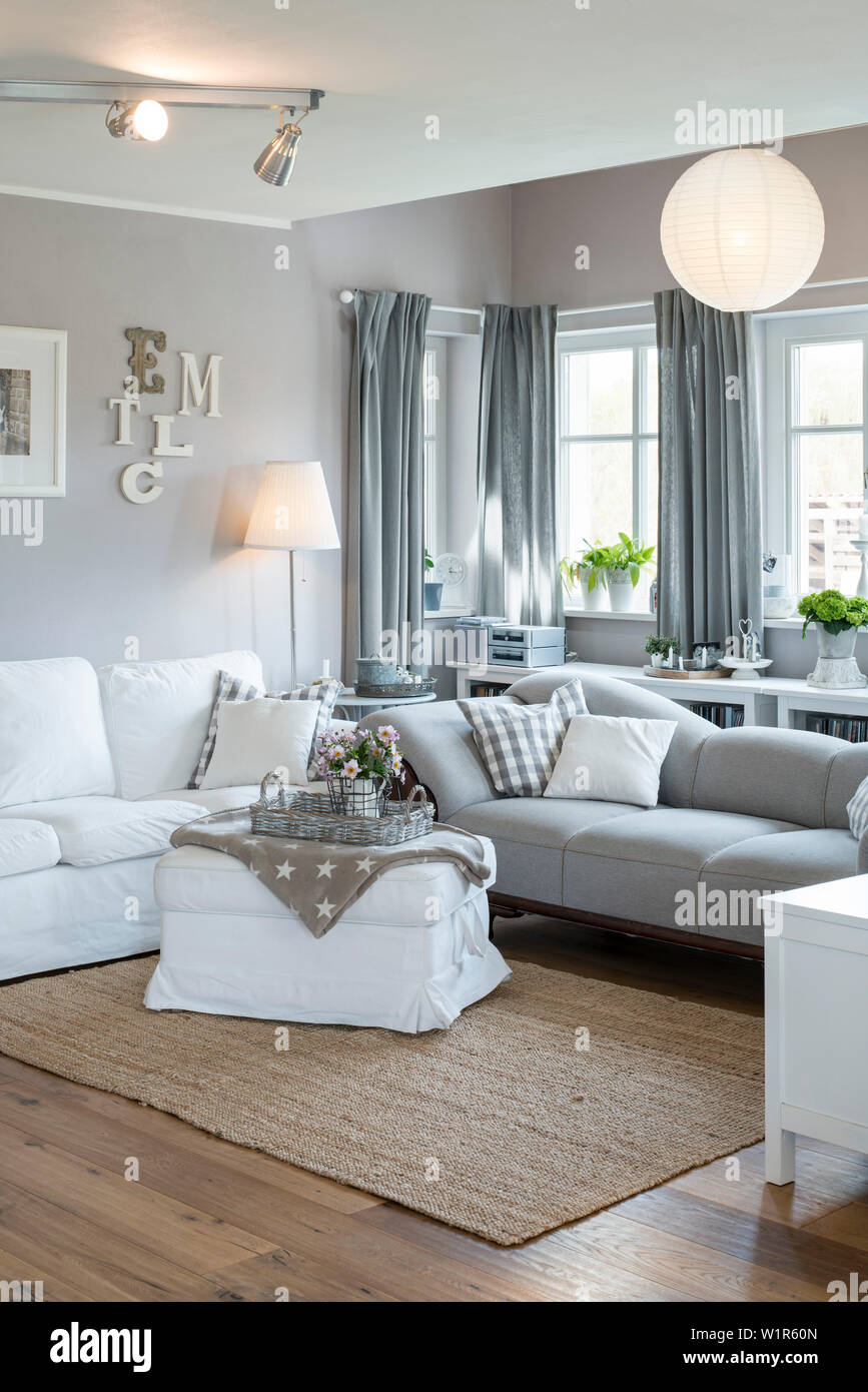 Modern Nordic Living Room In Family House With White And Gray Furniture And  Wooden Floor, Korbach, Hesse, Germany, Europe Stock Photo - Alamy