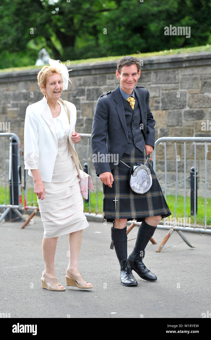 Edinburgh, UK. 3 July 2019.  Her Majesty The Queen has hosted her annual garden party at The Palace of Holyroodhouse in Edinburgh during Royal Week in Scotland.  Her Majesty The Queen's Garden Party was attended by people from all backgrounds and walks of life.  The sun made a fantastic appearance and the band played upbeat music and some covers of well known numbers.  Guests enjoyed afternoon tea with gourmet sandwiches, cakes and royal chocolates. Credit: Colin Fisher/Alamy Live News Stock Photo