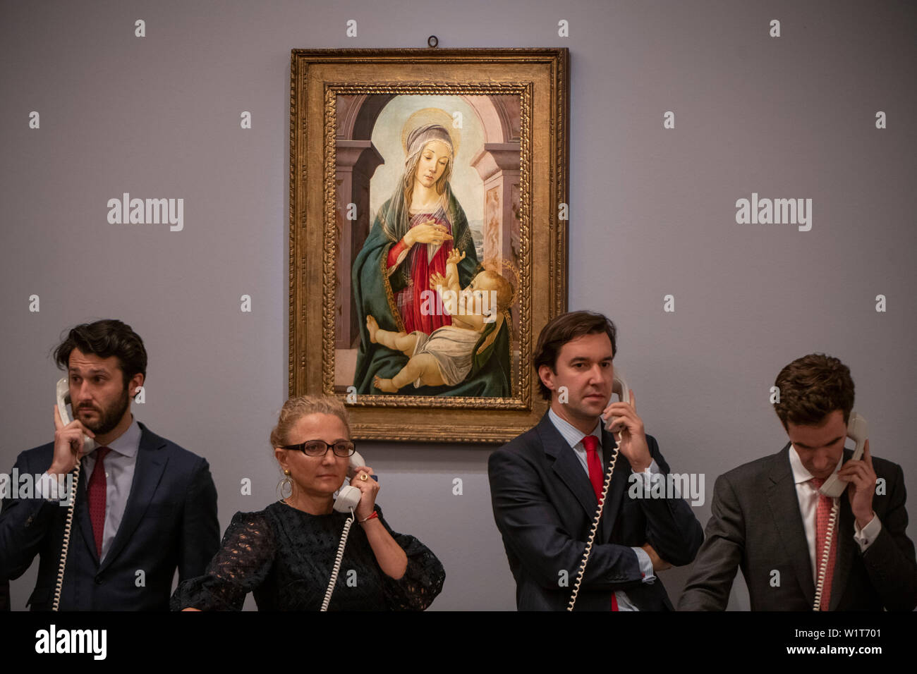Sotheby’s, London, UK. 3rd July 2019. The summer Old Masters Evening sale offers paintings from the 14th - 19th century by many of the most important painters of Western art. Highlights include a masterpiece by each of Britain’s greatest landscape painters - Turner, Constable and Gainsborough - and extraordinary works from the Baroque by Ribera and the exceptionally rare Johann Liss. Image: Alessandro di Mariano Filipepi, called Sandro Boticelli and Studio, Madonna and Child, sells for £3,015,000. Credit: Malcolm Park/Alamy Live News. Stock Photo
