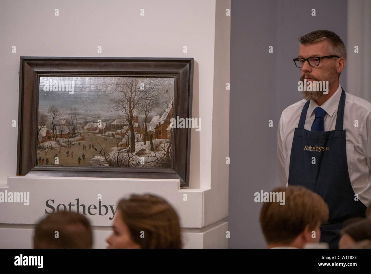 Sotheby’s, London, UK. 3rd July 2019. The summer Old Masters Evening sale offers paintings from the 14th - 19th century by many of the most important painters of Western art. Highlights include a masterpiece by each of Britain’s greatest landscape painters - Turner, Constable and Gainsborough - and extraordinary works from the Baroque by Ribera and the exceptionally rare Johann Liss. Image: Pieter Brueghel the Younger, Winter Landscape with a Bird Trap. Credit: Malcolm Park/Alamy Live News. Stock Photo