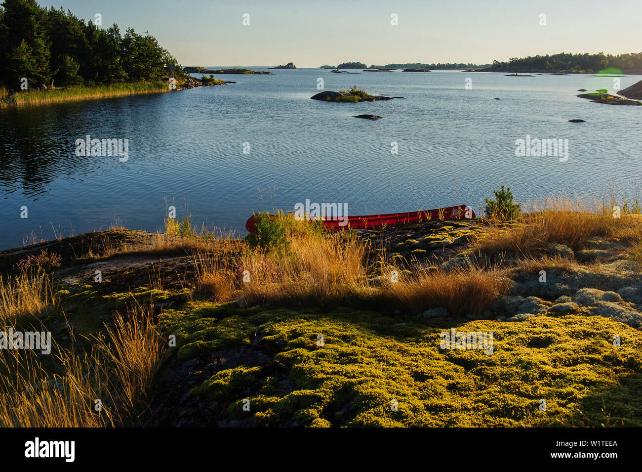 Sunrise with canoe, landscape Kallandsö at Lake Vättern, Sweden Stock ...
