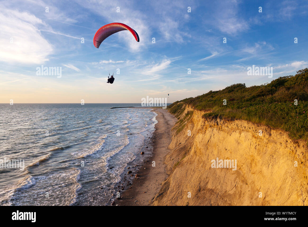 Paraglider at Hohes Ufer near Ahrenshoop, Baltic Sea, Mecklenburg-West Pomerania, Germany Stock Photo