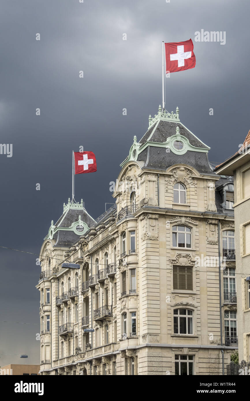 Utoschloss, historic city palais, neo baroc, swiss flag, Utoquai , Seefeld, Zurich, switzerland Stock Photo