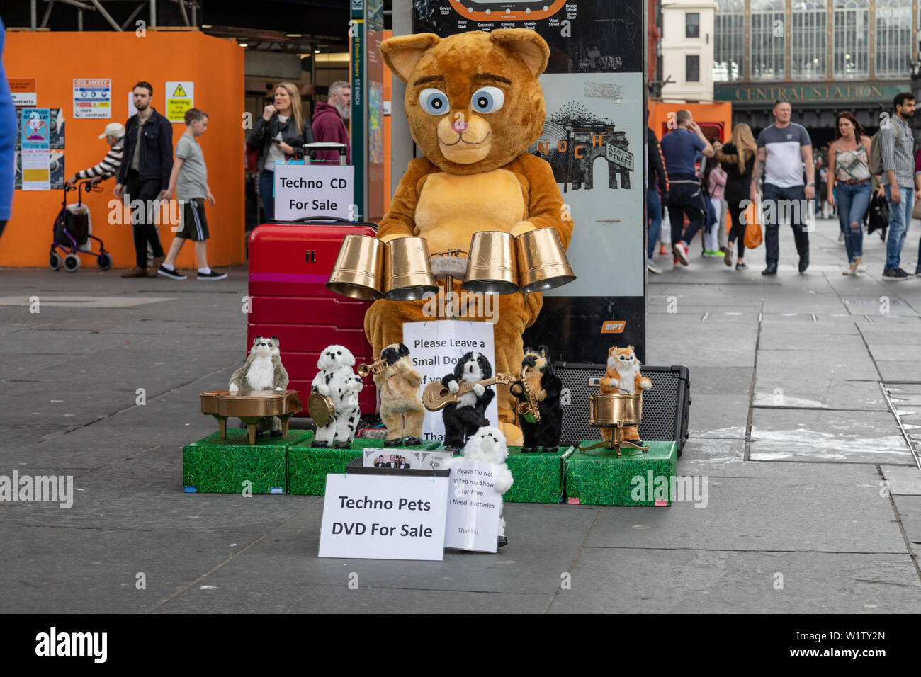 A Techno Cat playing techno music at St Enoch Square in Glasgow Stock Photo
