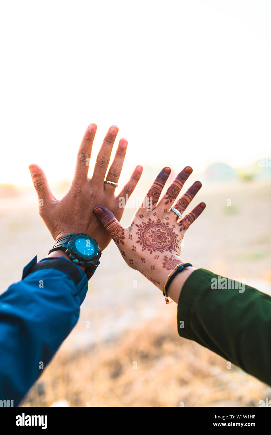 Young And Happy Couple Holding Hands Man Or Boy And Girl Holding Their Hands The Girl S Han Has Henna Asian Couple Love Each Other Stock Photo Alamy