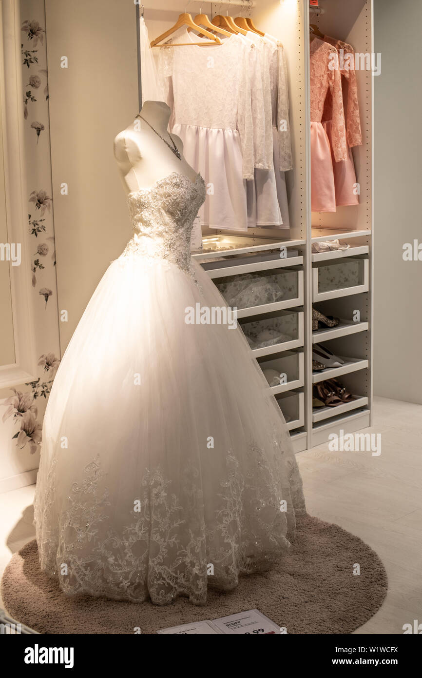 Lodz, Poland, Jan 2019 exhibition, interior IKEA store. Wardrobes, wedding dress for bride, IKEA sells ready-to-assemble furniture, home accessories Stock Photo