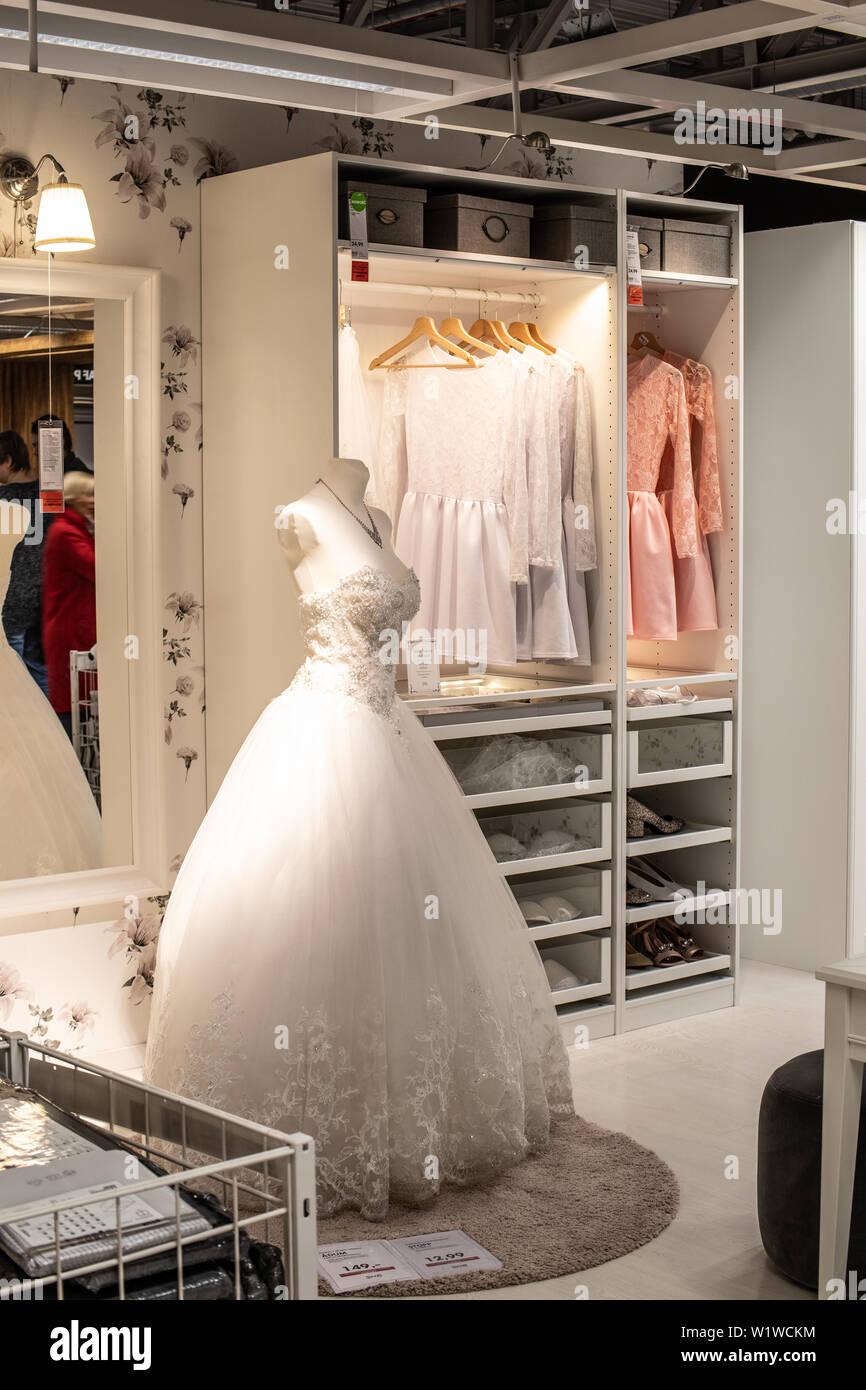 Lodz, Poland, Jan 2019 exhibition, interior IKEA store. Wardrobes, wedding dress for bride, IKEA sells ready-to-assemble furniture, home accessories Stock Photo