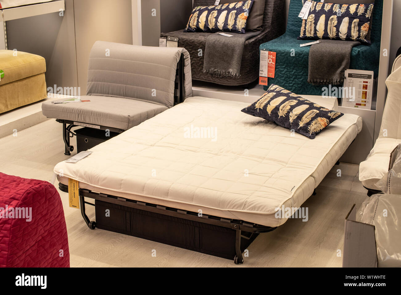 Lodz, Poland, Jan 2019 exhibition, interior IKEA store. modern sofas. IKEA designs, sells ready-to-assemble furniture, appliances, home accessories. Stock Photo