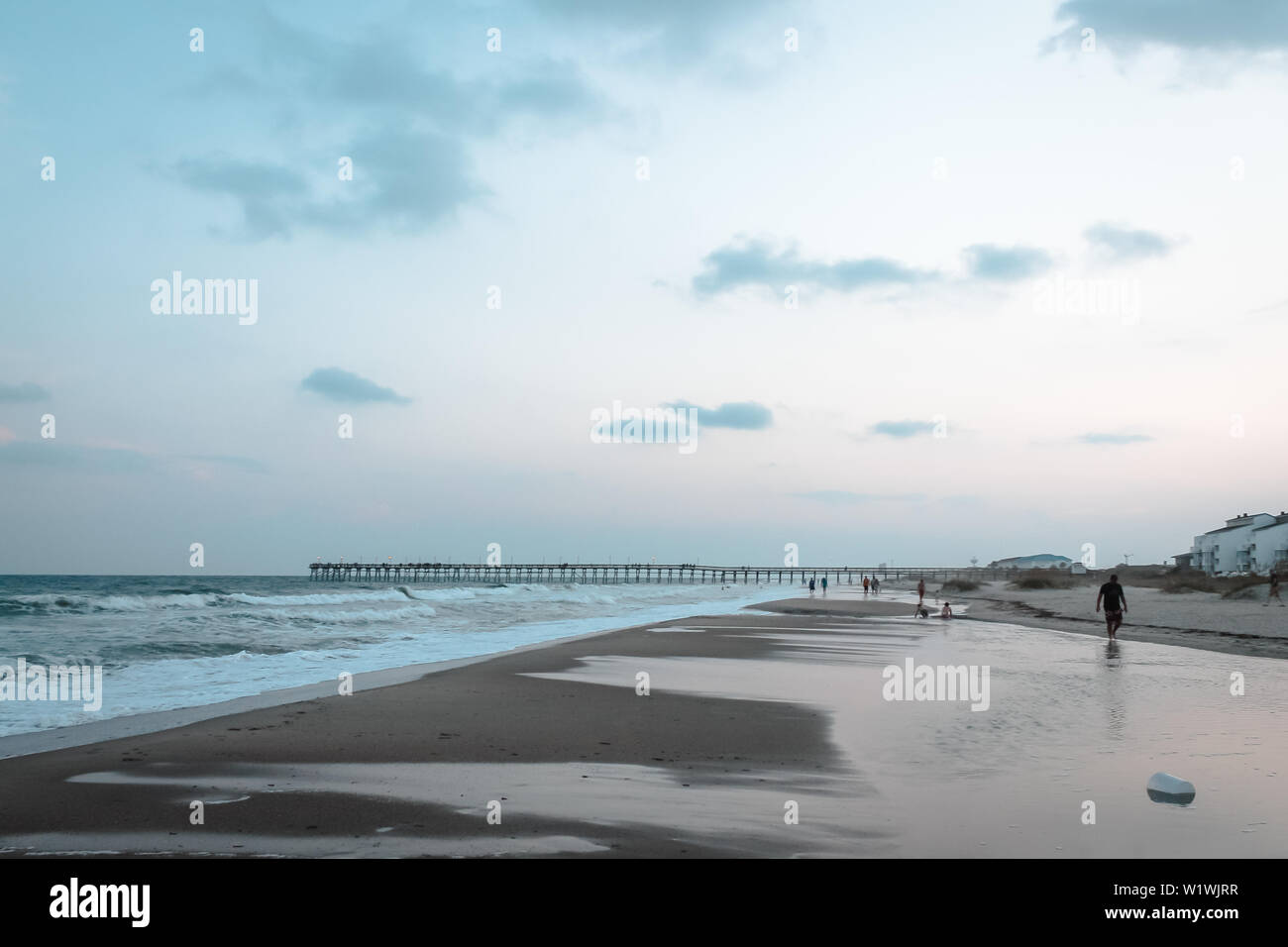 People walking the beach in North Carolina Stock Photo Alamy