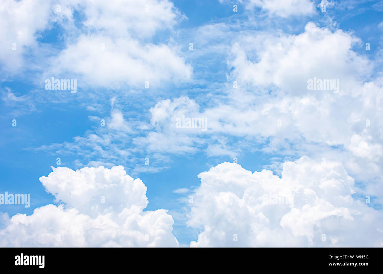 The beauty of the sky with clouds and the sun in summer. Stock Photo