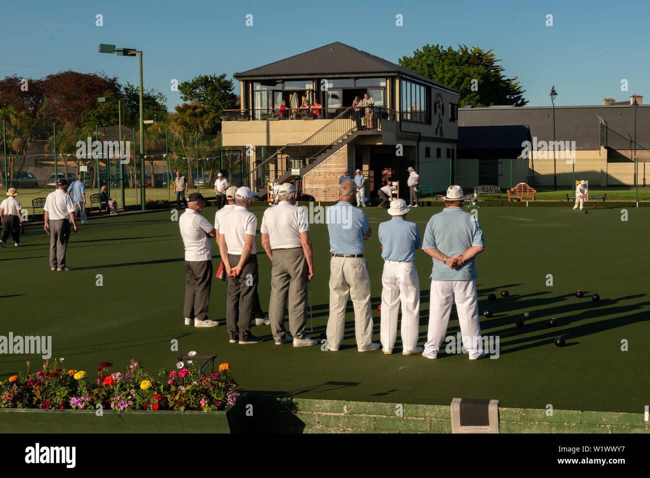 Seniors men playing lawn bowls at The Causeway Bowls Club in Dungarvan, County Waterford, Ireland Stock Photo