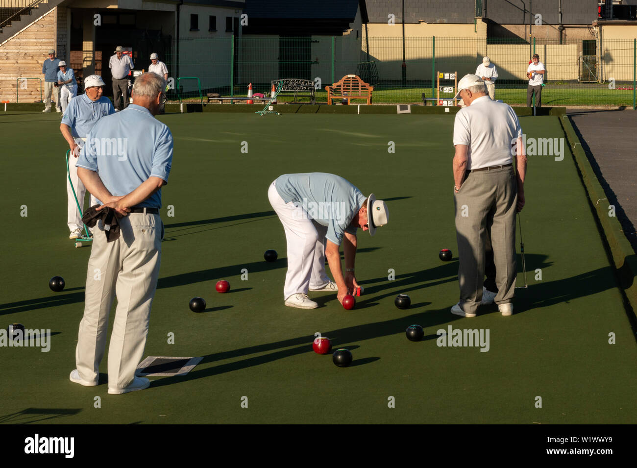 Senior men playing lawn bowls at The Causeway Bowls Club in Dungarvan, County Waterford,  Ireland Stock Photo