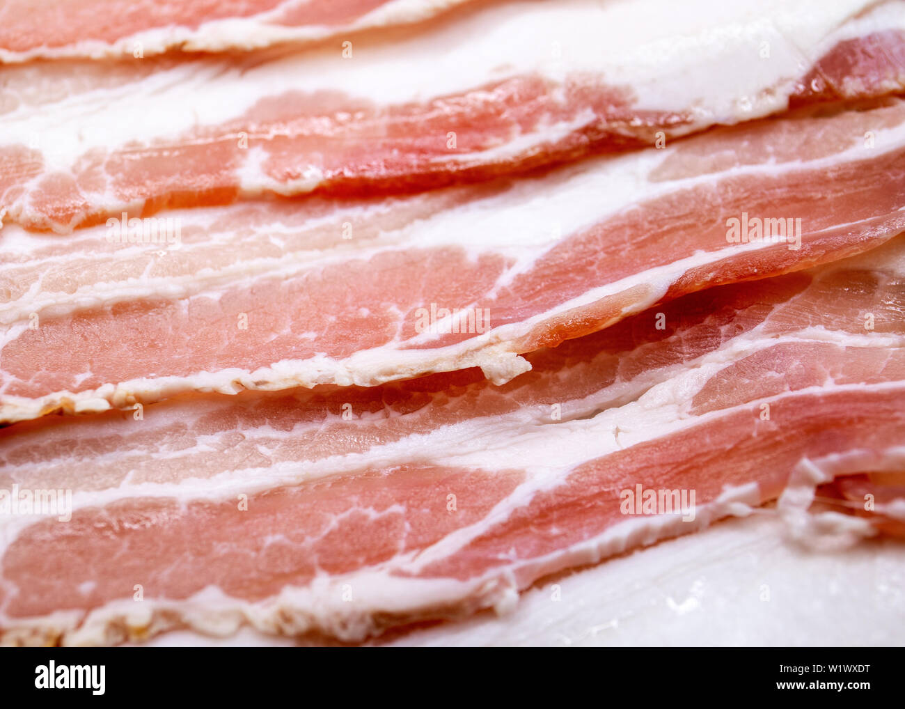 Slices of bacon, saltcured pork Stock Photo Alamy