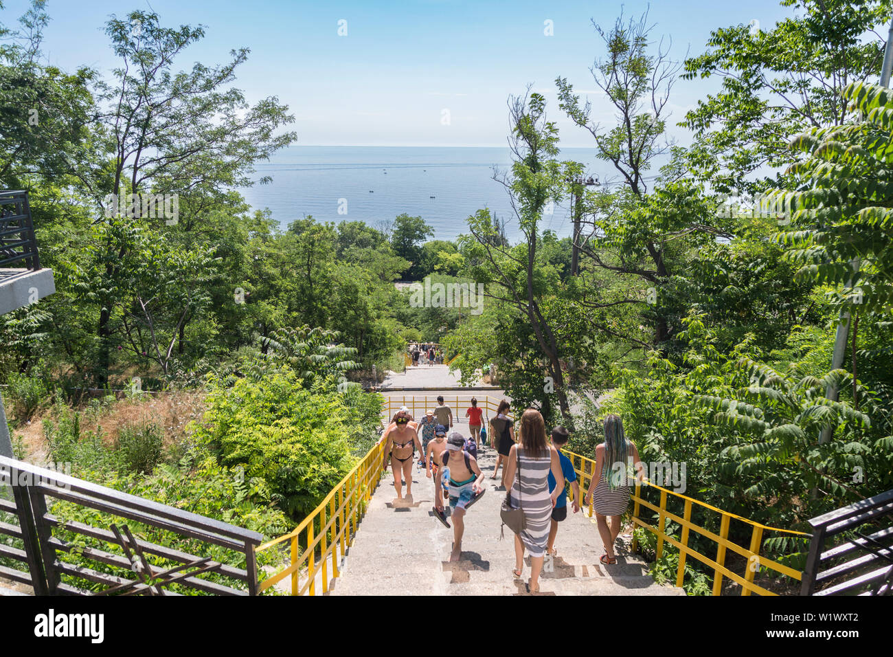 At stairs to 15 Fontana beach of Odessa, Ukraine - June 8, 2019: People walking to the beach 15 Fontana in Odessa, Ukraine Stock Photo