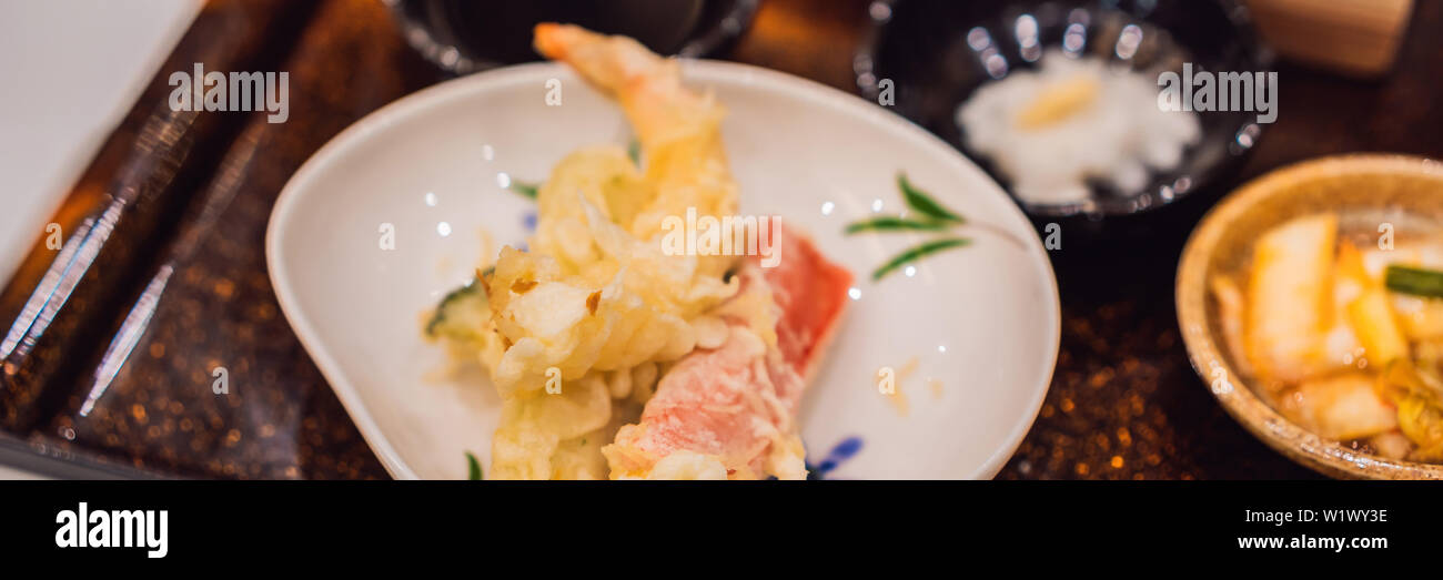 Bento set of prawn tempura and chicken teriyaki in japanese restaurant