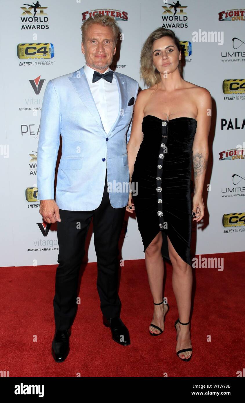 Las Vegas, NV, USA. 3rd July, 2019. Dolph Lundgren, Jenny Sandersson at arrivals for 11th Annual Fighters Only World MMA Awards, Grand Ballrooms at Palms Casino Resort, Las Vegas, NV July 3, 2019. Credit: MORA/Everett Collection/Alamy Live News Stock Photo