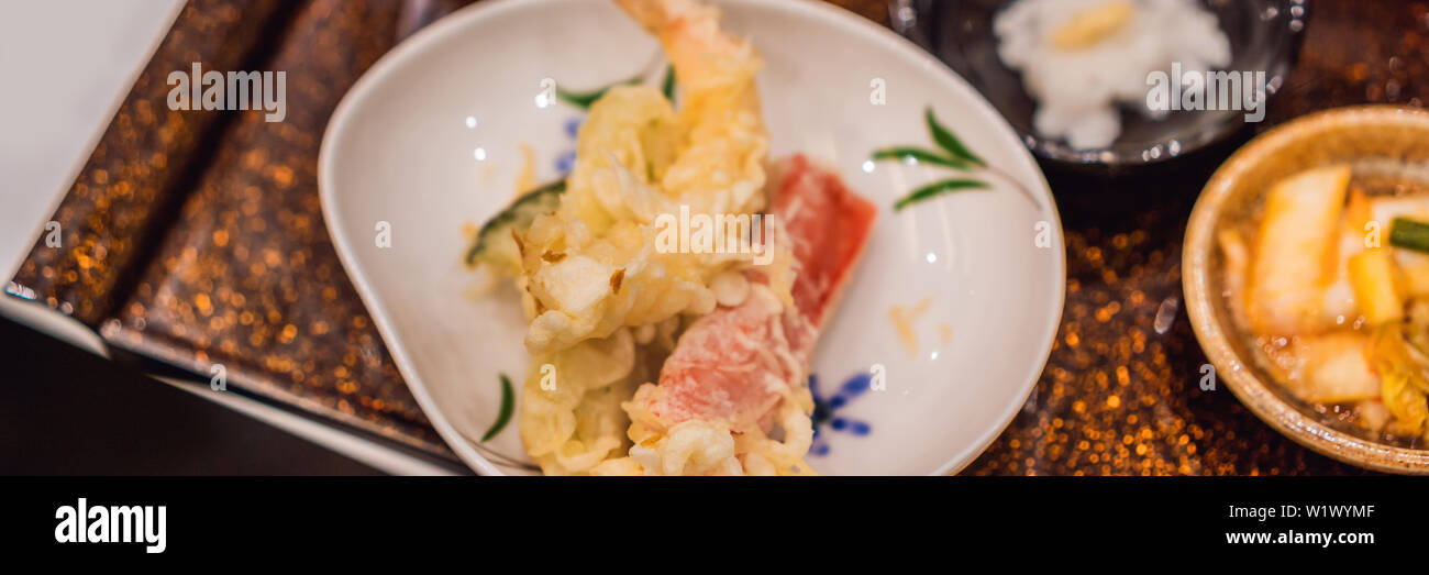 Bento set of prawn tempura and chicken teriyaki in japanese restaurant