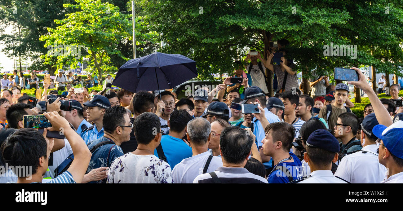 Mobile phone photographers film scuffle at Hong Kong counter protest Stock Photo