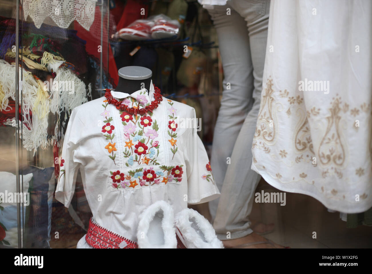Shop of souvenirs and national clothes on a shopping street. Zagreb
