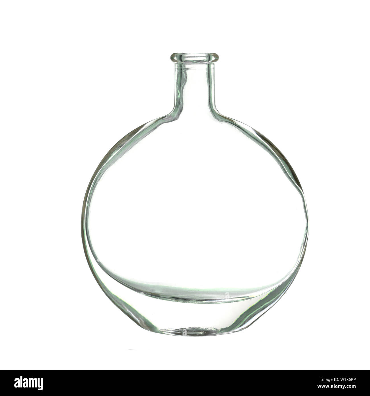Old flat round glass bottle isolated on white Stock Photo Alamy