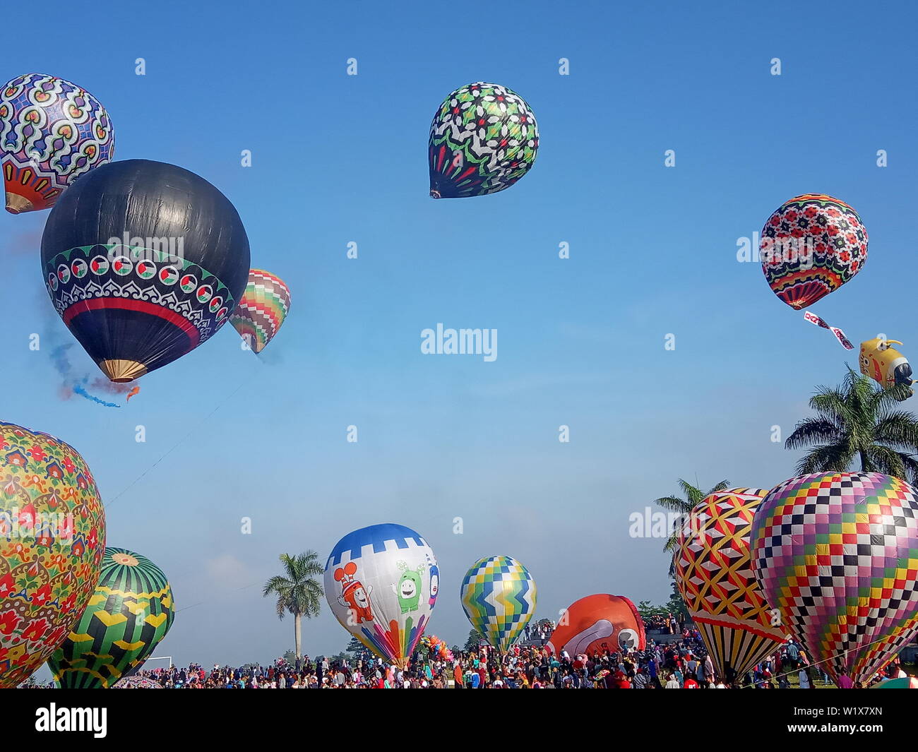 the excitement of traditional big balloon flights, every year on the day of Eid al-Fitr, after the fasting month by the people of Wonosobo, Indonesia Stock Photo