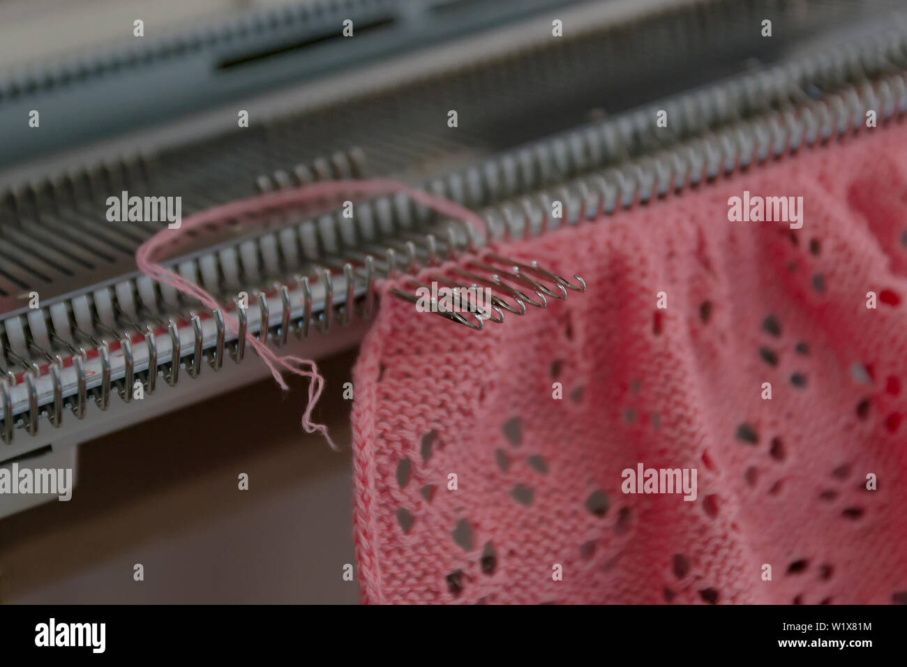 Manual knitting machine. A knitting machine is a device used to create