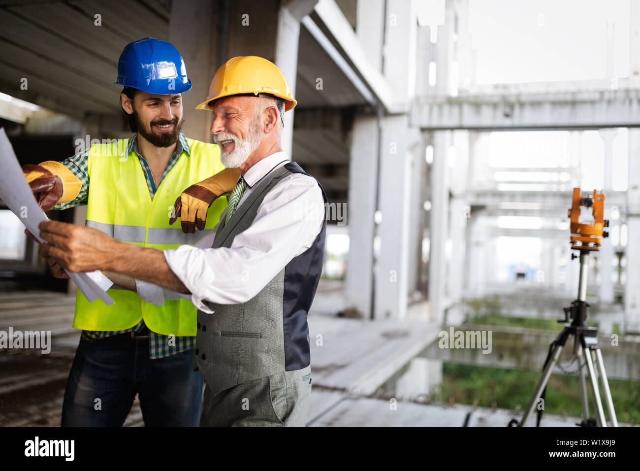 Group of construction engineer working in construction site Stock Photo ...