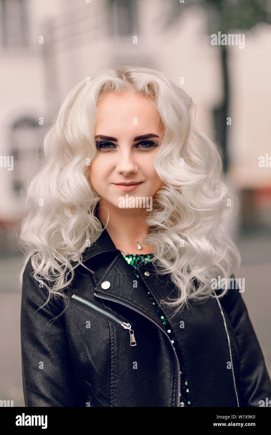 Photo Of Beautiful Girl With Silver Hair In A Leather Jacket Stock