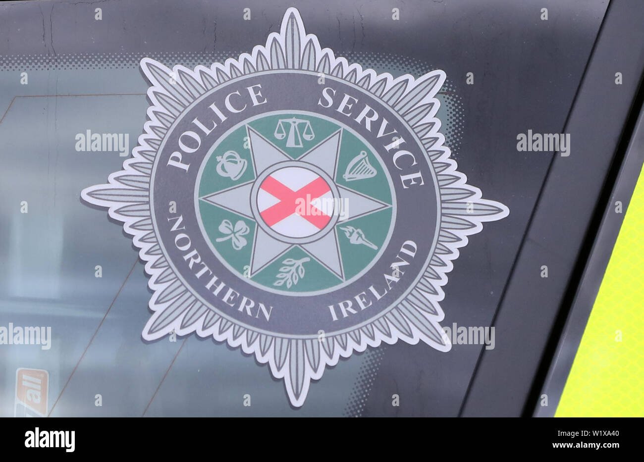 A stock picture of a Police Service of Northern Ireland (PSNI) logo badge in Belfast Northern Ireland. Stock Photo