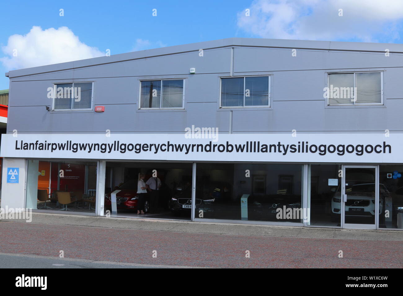 Llanfairpwllgwyngyllgogerychwyrndrobwllllantysiliogogog is a welsh village on Anglesey with the longest name in Britain with 58 characters Stock Photo