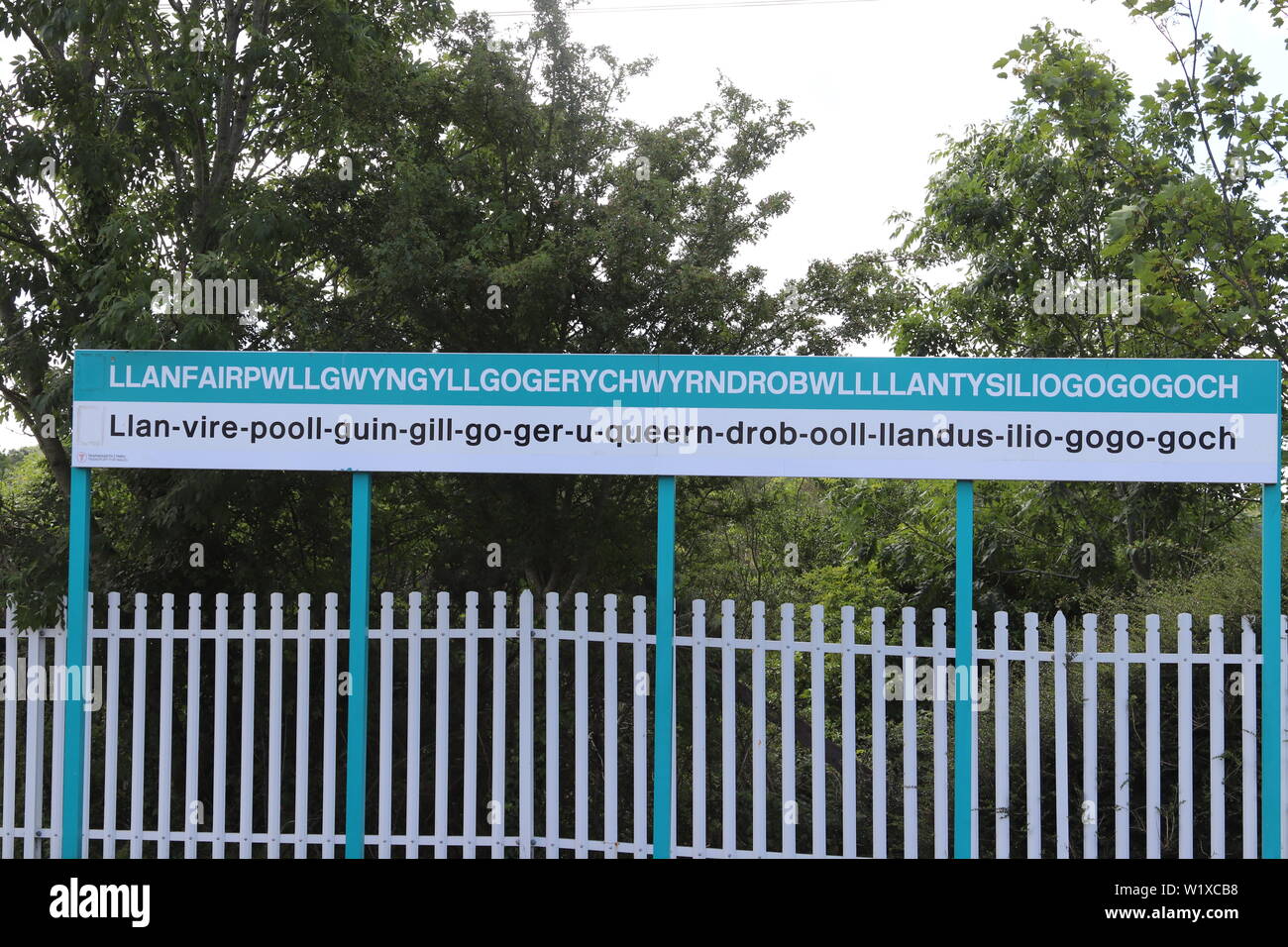 Llanfairpwllgwyngyllgogerychwyrndrobwllllantysiliogogog is a welsh village on Anglesey with the longest name in Britain with 58 characters Stock Photo