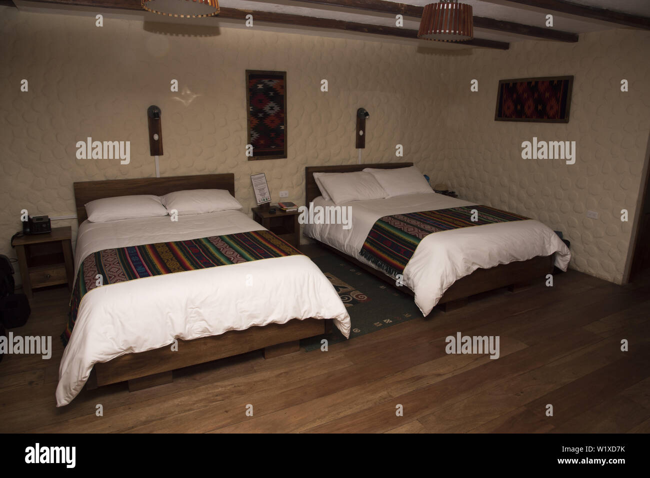 Comfortable guestroom at 2200 meters high Bellavista Lodge at the top of Tandayapa Valley in Ecuador.. Stock Photo