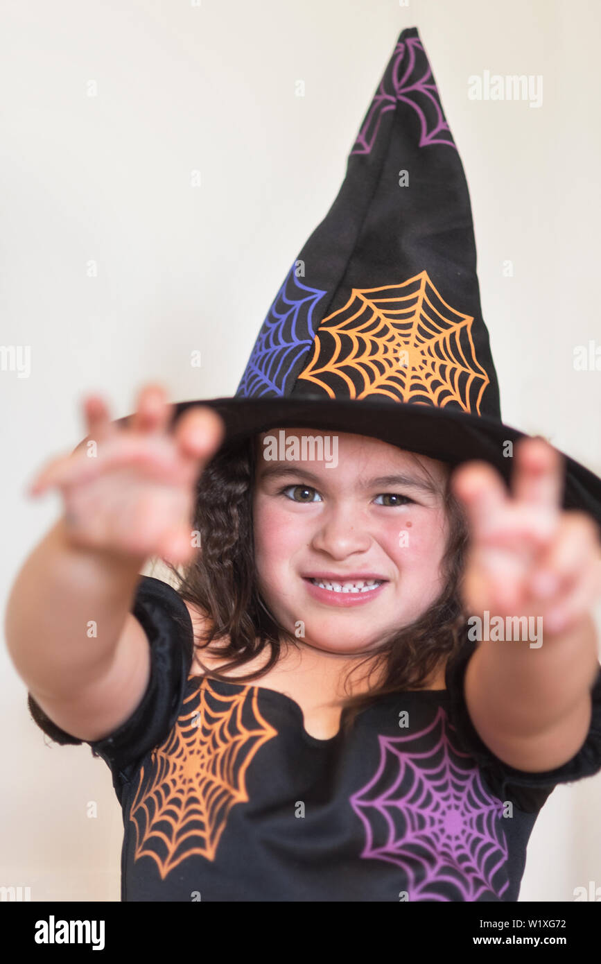 Funny Child Girl In Costume Halloween Witch Stock Photo - Alamy