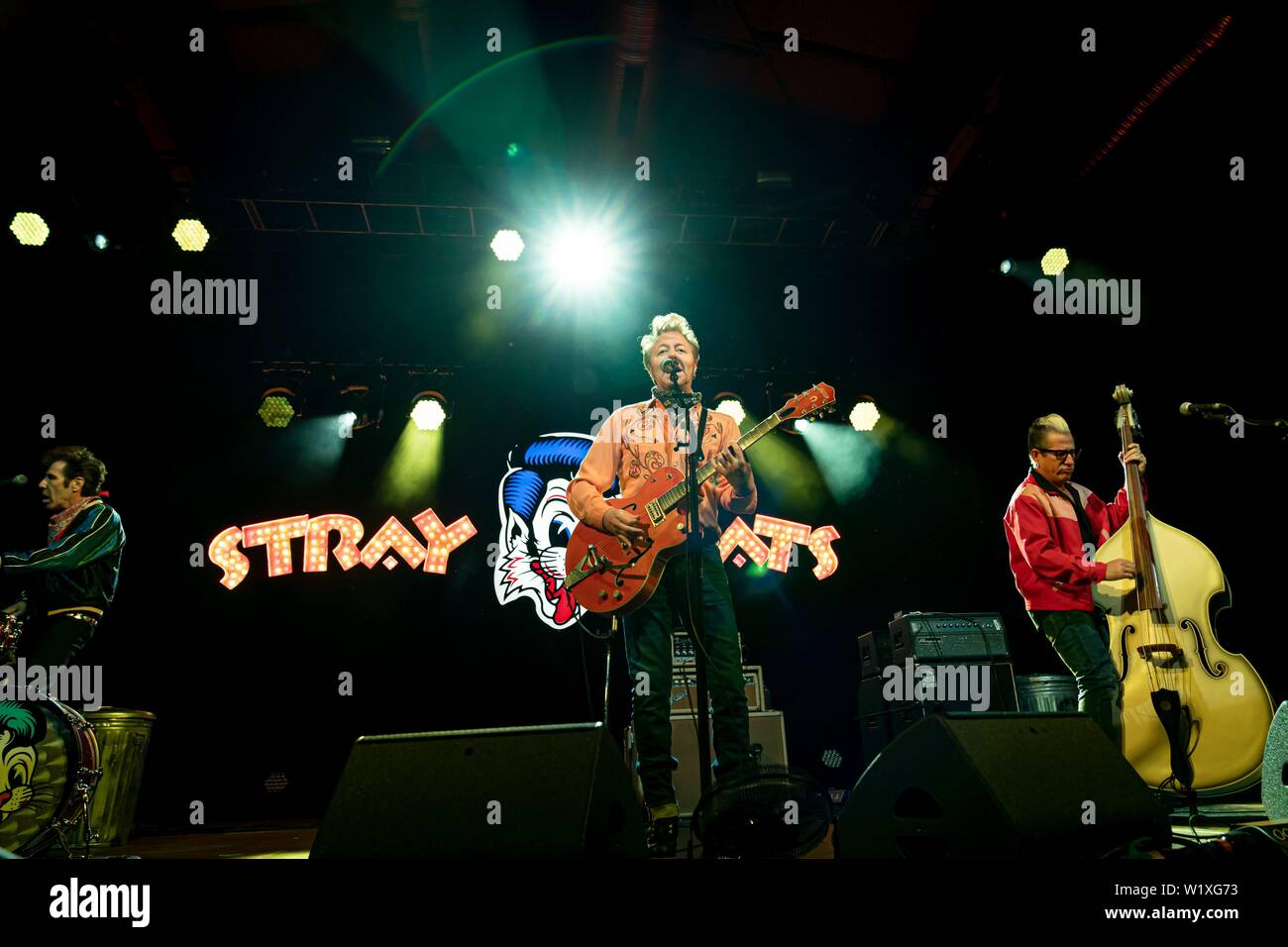 03.07.2019, the American rockabilly band Stray Cats live on stage on their 40th anniversary tour in the Columbiahalle in Berlin. The band performs in the original line-up of 1979 with Brain Setzer (guitar & vocals), Lee Rocker (double bass) and Slim Jim Phantom (drums). | usage worldwide Stock Photo