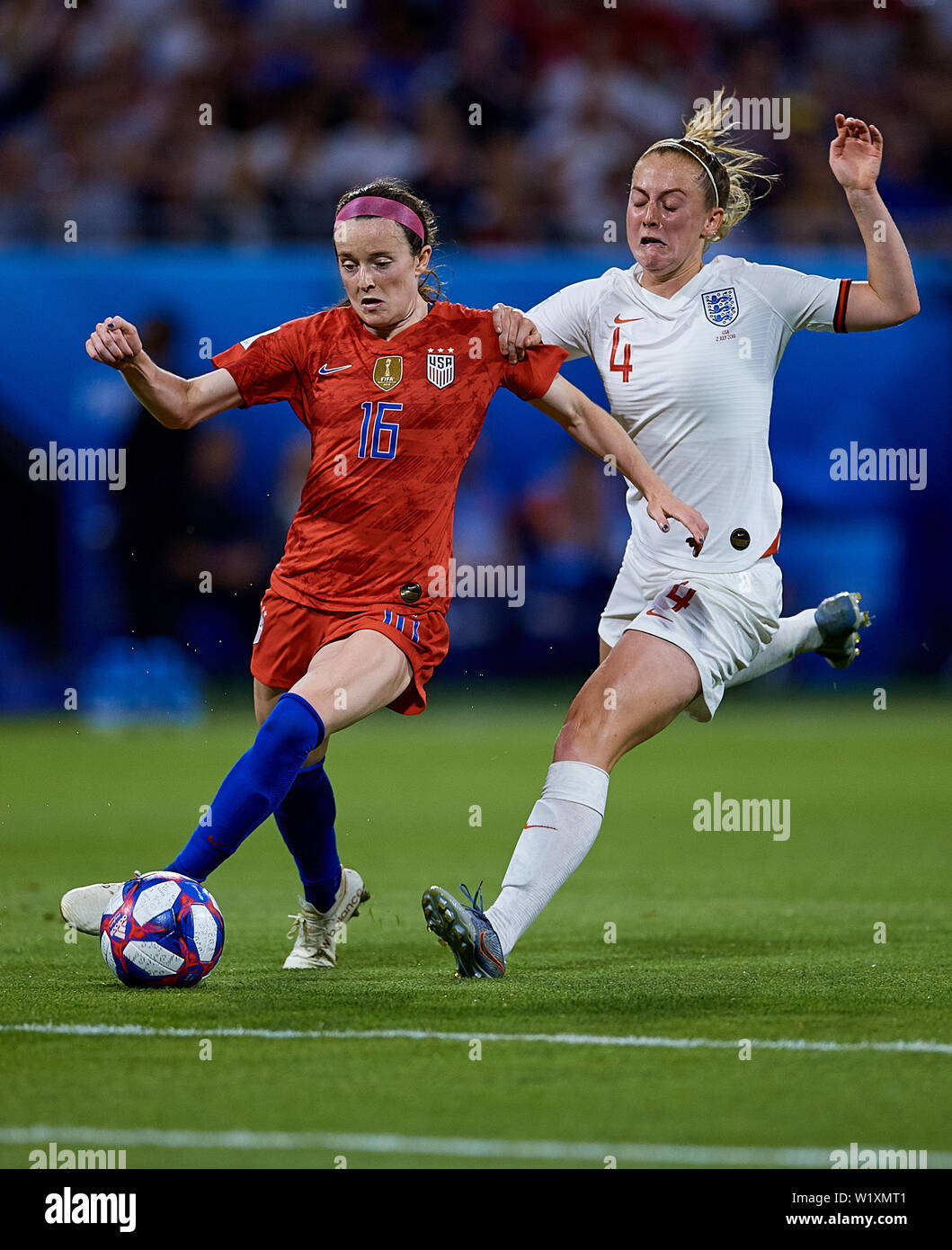 LYON, FRANCE - JULY 02: Rose Lavelle of the USA and Keira Walsh of England competes for the ball during the 2019 FIFA Women's World Cup France Semi Final match between England and USA at Stade de Lyon on July 2, 2019 in Lyon, France. (Photo by David Aliaga/MB Media) Stock Photo