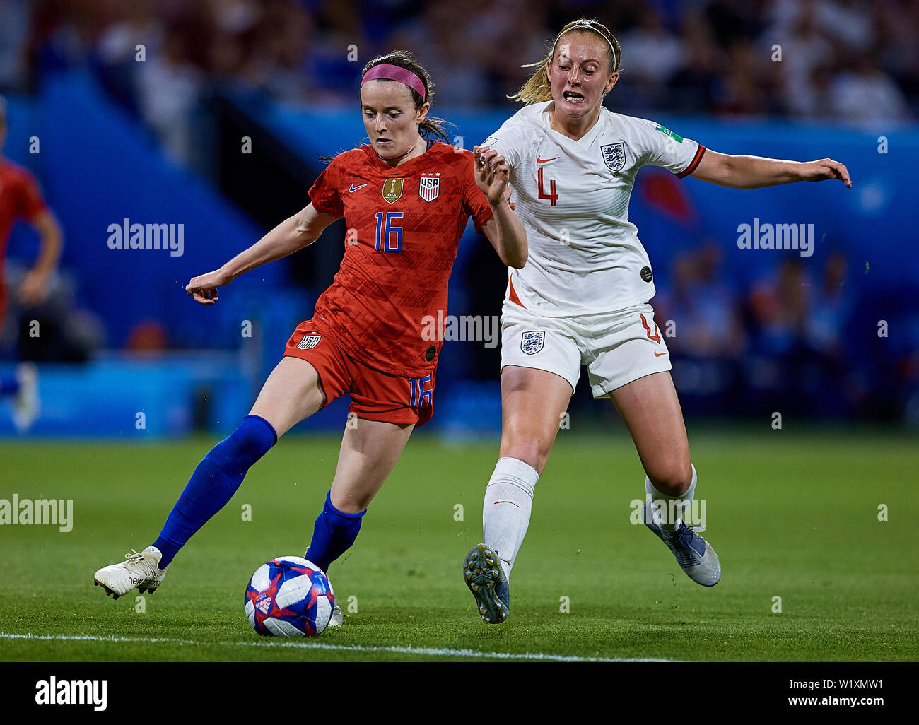 LYON, FRANCE - JULY 02: Rose Lavelle of the USA and Keira Walsh of England competes for the ball during the 2019 FIFA Women's World Cup France Semi Final match between England and USA at Stade de Lyon on July 2, 2019 in Lyon, France. (Photo by David Aliaga/MB Media) Stock Photo