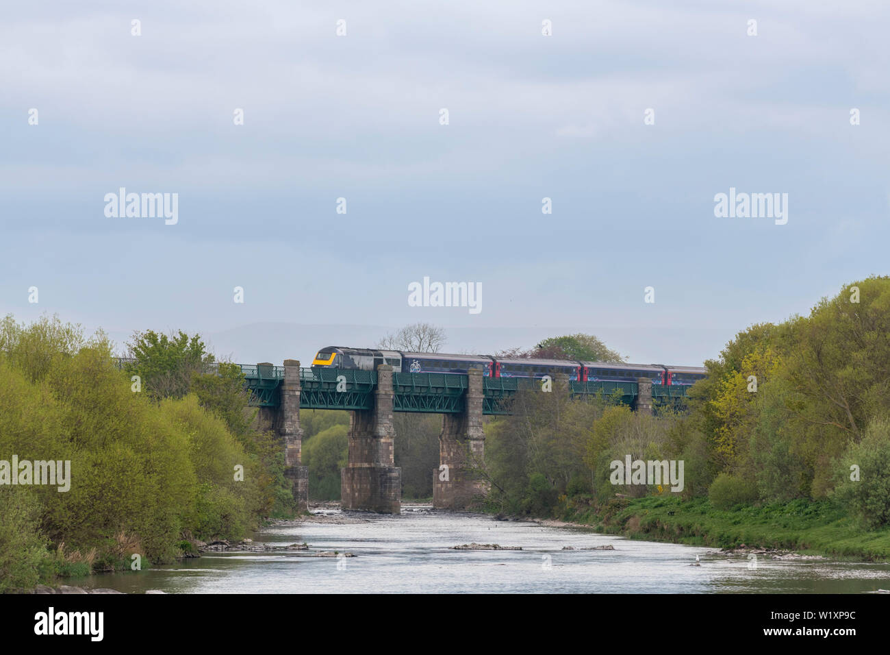 A Scotrail 'Inter7City' HST (High Speed Train) with an Image of a Bicycle on Its Side Crossing the River North Esk at Marykirk Stock Photo