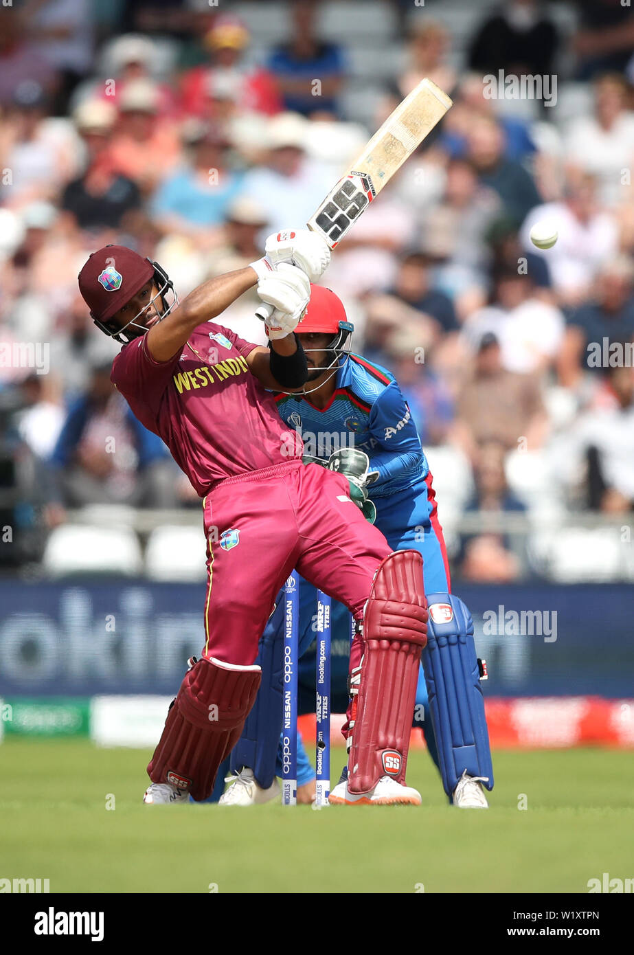 West Indies' Shai Hope strikes the ball for a boundary during the ICC Cricket World Cup group stage match at Headingley, Leeds. Stock Photo