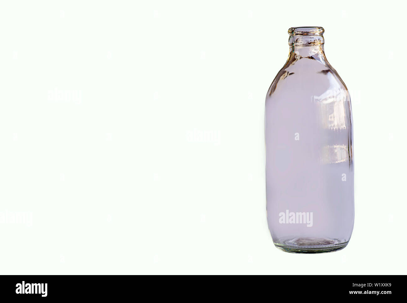 Isolated Glass bottles on a white background Stock Photo - Alamy