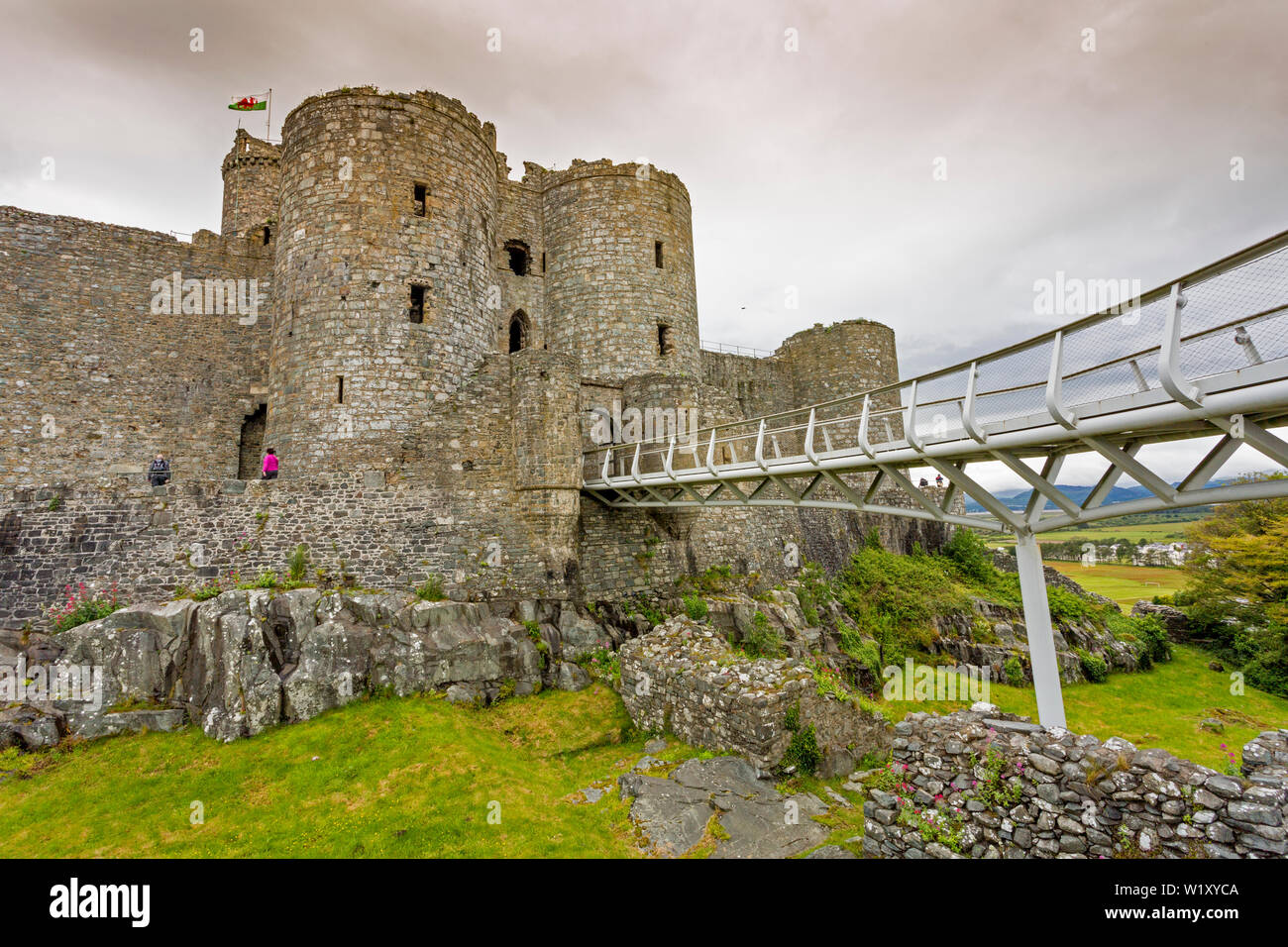 The modern 'floating bridge' that now gives access to the castle Gatehouse in Harlech, Gwynedd, Wales, UK Stock Photo