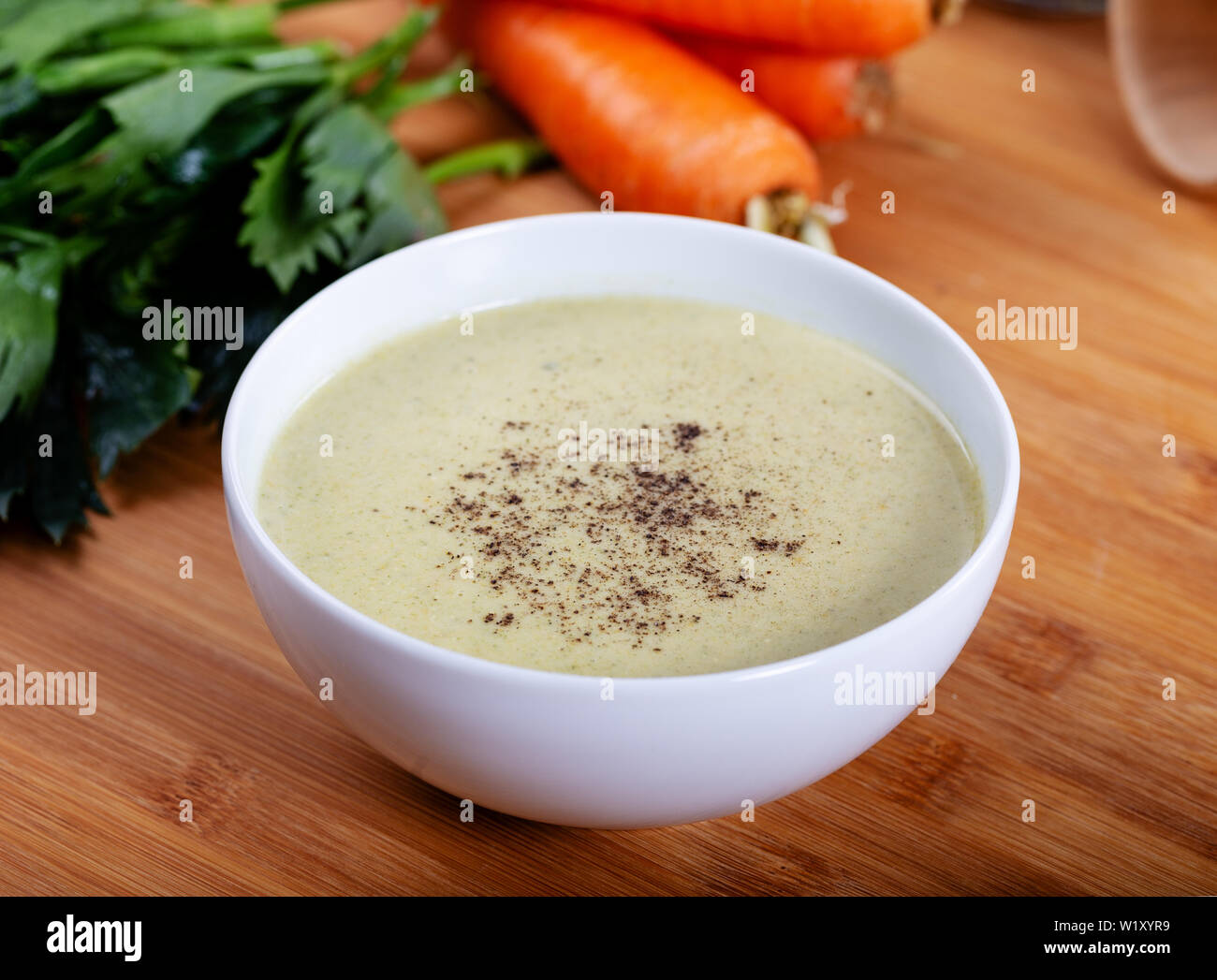 Celery soup with carrot, onion and bechamel sauce Stock Photo Alamy