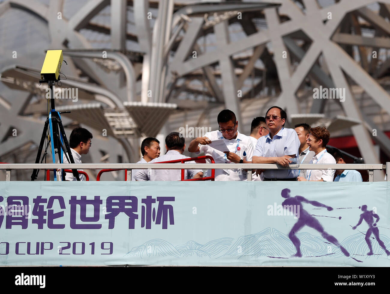 Beijing, China. 4th July, 2019. Gou Zhongwen, director of China's General Administration of Sport, watches the race during Day 1 2019 FIS China Beijing Roller Ski World Cup in Beijing, China, on July 4, 2019. Credit: Wang Lili/Xinhua/Alamy Live News Stock Photo