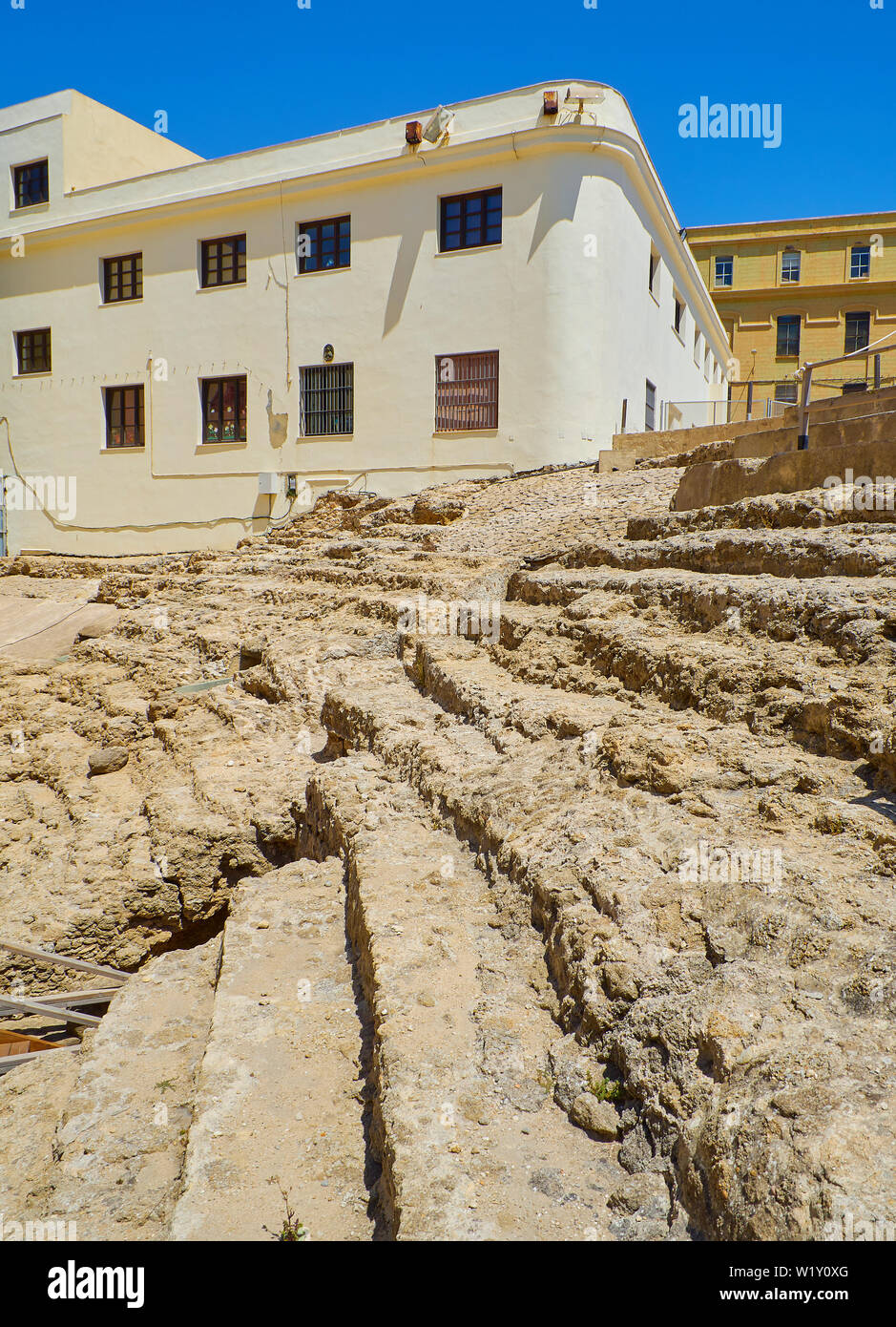 Parabolic tiered seating detail.Remains of the Roman Theatre of the ancient Gades in Hispania, the current city of Cadiz, Andalusia, Spain. Stock Photo